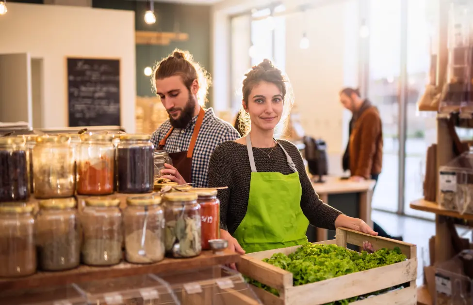 Bulk food store employees working after pest treatment
