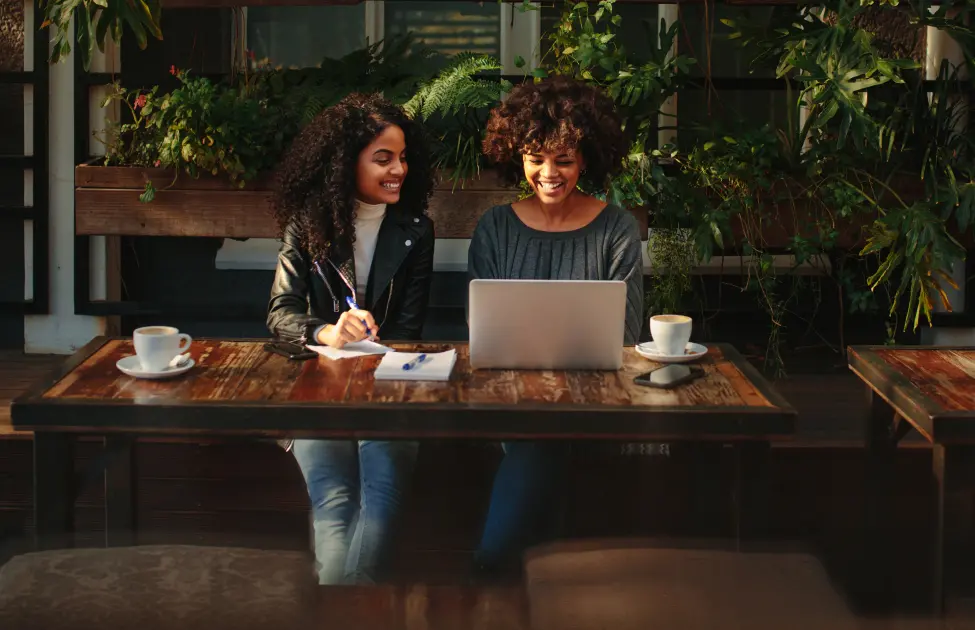 Colleagues working in a pest-free coffee shop in Long Island after pest treatment