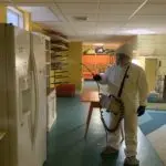 Twin Forks Pest Control® disinfecting a basement