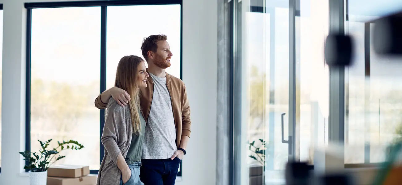 New homeowners enjoying the view from their pest-free home in Long Island